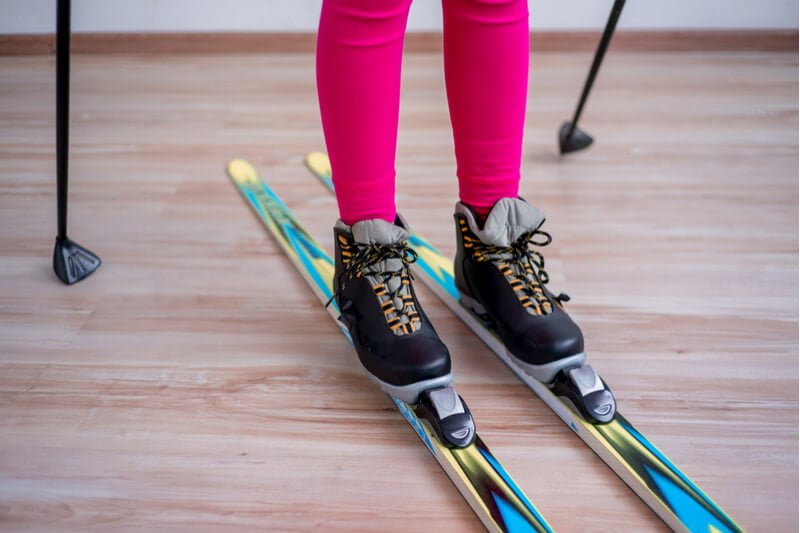 School pupil wearing skis